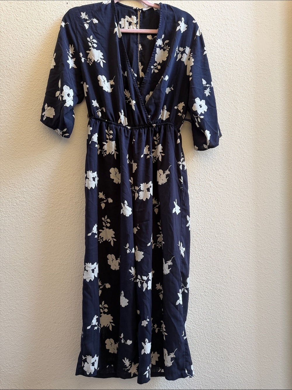 Collective Concepts Navy Jumpsuit with White Floral Print